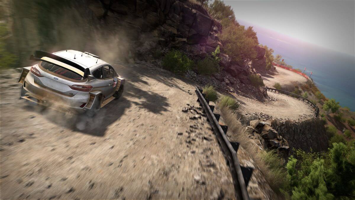 Players can drive over rough terrain with scenic views in WRC 8.
